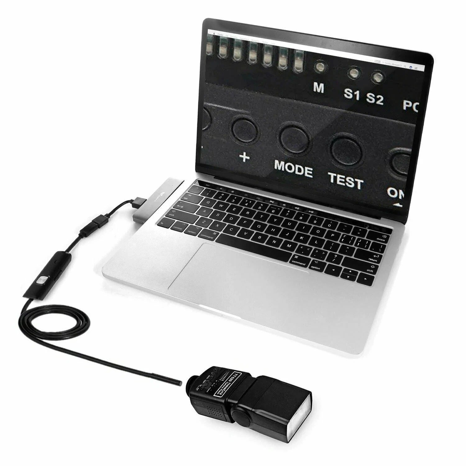 USB endoscope control adapter with cable connected to a laptop
