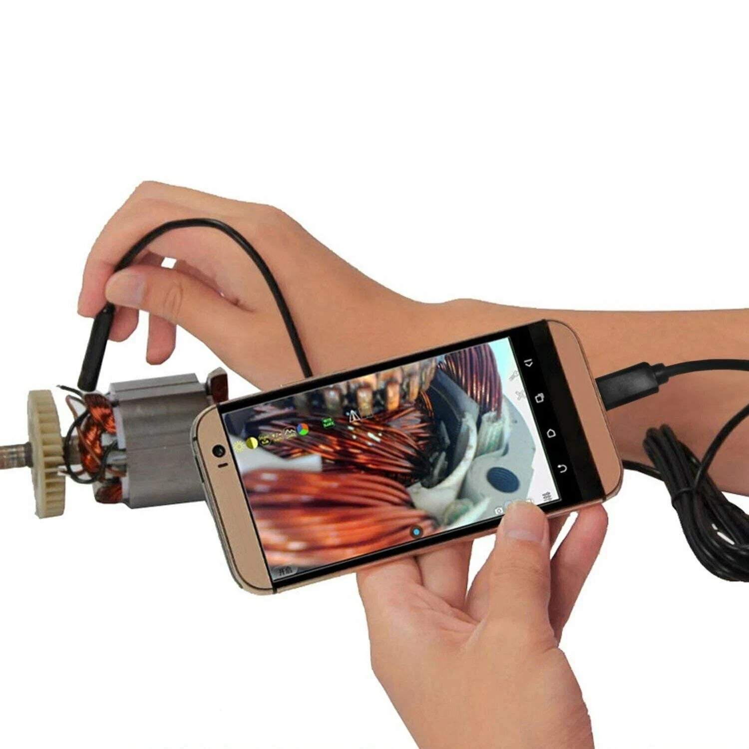 Handheld phone showing endoscope video with wired inspection camera connected