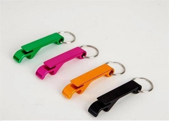 Green, pink, orange, and black metal bottle opener keychains with key rings