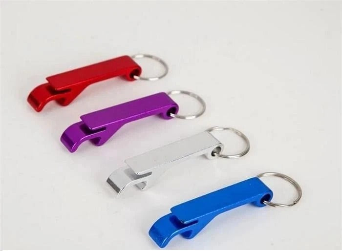 Red, purple, silver, and blue metal bottle opener keychains with key rings