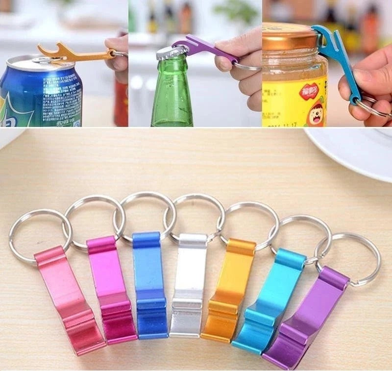 Multi-color metal bottle opener keychains with key rings, arranged on a table