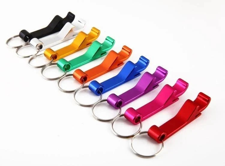 Colorful metal bottle opener keychains with circular key rings, lined up