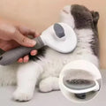 Self-cleaning pet grooming brush for cats and dogs with gray handle and round head