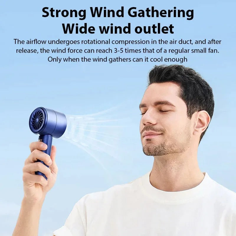 Handheld portable fan in use, held near face with visible airflow grille and LED display