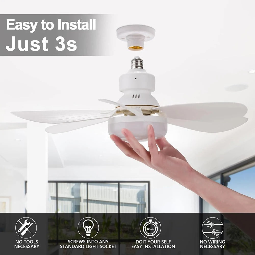Ceiling fan with light and five white blades with a hand installing the lamp socket