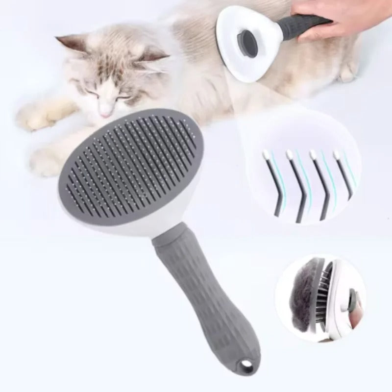 Pet grooming brush with gray handle and dark bristle pad plus extra brush attachments
