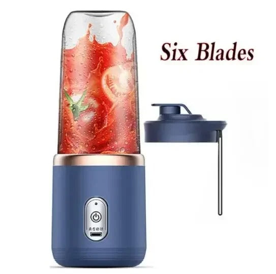 Blue portable mini blender with clear cup and visible blade assembly tool